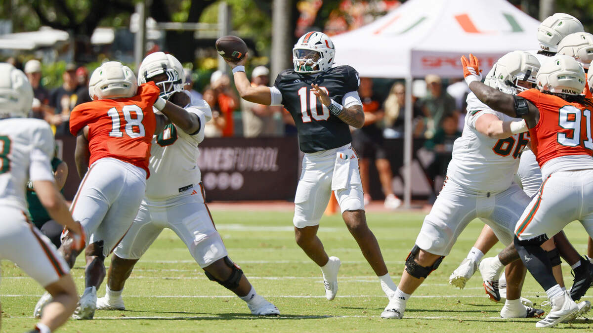 Miami Hurricanes quarterback Darian Mensah (10) passes during UM’s spring football game at Cobb Stadium on the University of Miami campus in Coral Gables, Florida, on Saturday, April 18, 2026.